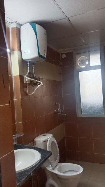 Bathroom in 2 BHK Apartment at Mahagun Mywoods, Sector 16c Greater Noida – for Rent