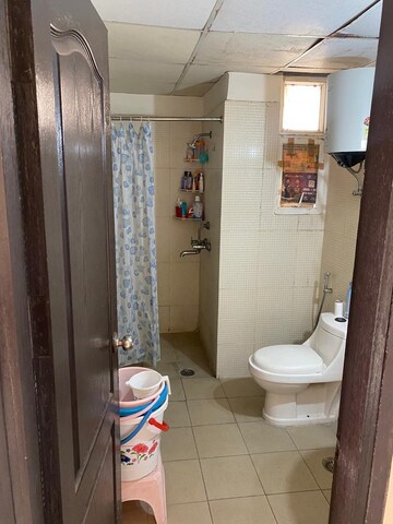 Bathroom in 1 BHK Apartment at Aditya Celebrity Homes, Sector 76 – for Sale