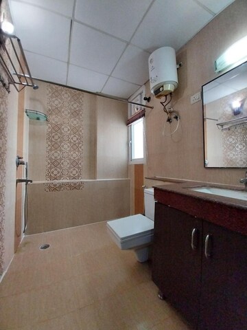Bathroom in 3 BHK Apartment at Purvanchal Royal Park, Sector 137 – for Rent