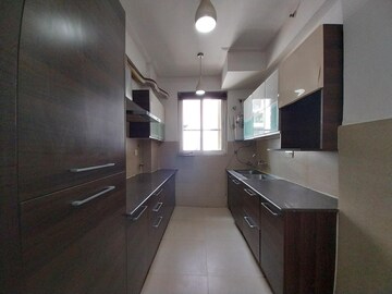 Kitchen in 3 BHK Apartment at Purvanchal Royal Park, Sector 137 – for Rent