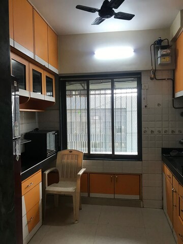 Kitchen in 1 BHK Apartment at Ajmera Odyessey Apartment, Bhakti Park – for Rent