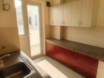 Kitchen in 4 BHK Apartment at CHD Avenue 71, Sector 71 – for Rent