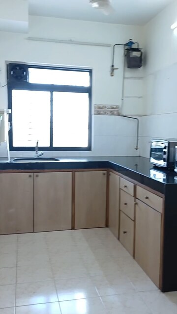 Kitchen in 2 BHK Apartment at Deep Apartment Andheri, Andheri West – for Rent