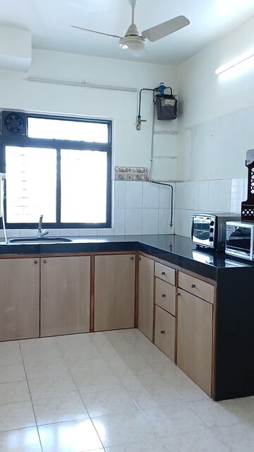 Kitchen in 2 BHK Apartment at Deep Apartment Andheri, Andheri West – for Rent