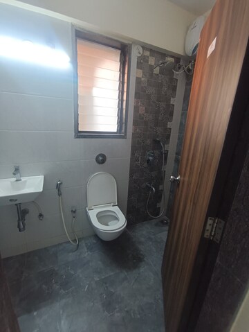 Bathroom in 2 BHK Apartment at Abrol Avirahi Heights, Malad West – for Rent