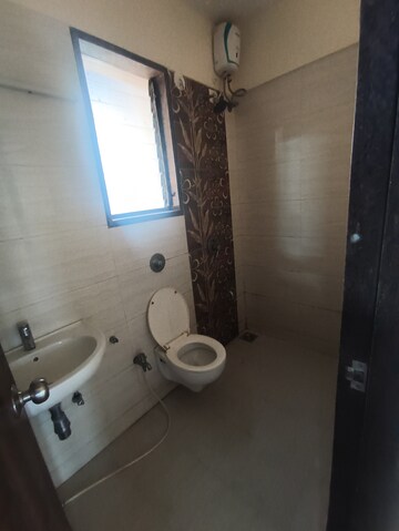 Bathroom in 2 BHK Apartment at Abrol Avirahi Heights, Malad West – for Rent