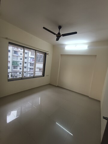Bedroom in 2 BHK Apartment at Rajendra Dolphin Tower, Malad West – for Rent