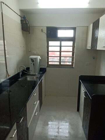 Kitchen in 2 BHK Apartment at Sheth Vasant Oasis, Andheri East – for Rent