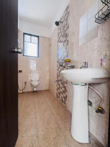 Bathroom in 2 BHK Apartment at Krishna Smruti Garden, Punawale – for Rent