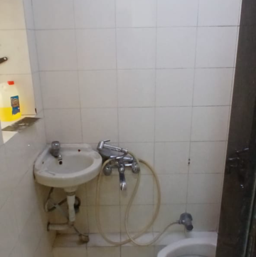 Bathroom in 2 BHK Apartment at Harmony CHS Andheri West, Lokhandwala Complex – for Rent