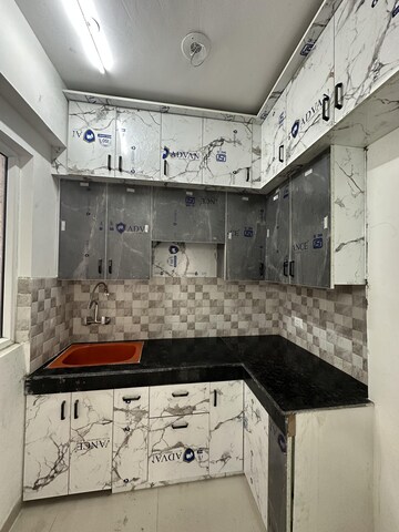 Kitchen in 2 BHK Apartment at Oasis GrandStand, Sector 22d Yamuna Expressway – for Rent