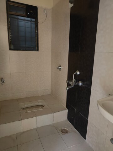 Bathroom in 2 BHK Apartment at Dosti Vihar, Samata Nagar – for Rent