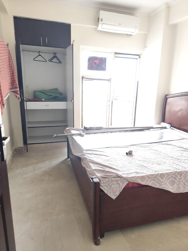 Bedroom, aims-golf-city 2.5 Bedroom 1150 Sq.Ft. Apartment In Sector 75 Noida 9774725
