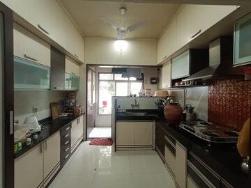 Kitchen in 3 BHK Apartment at Swagat Classic, Model Colony – for Rent