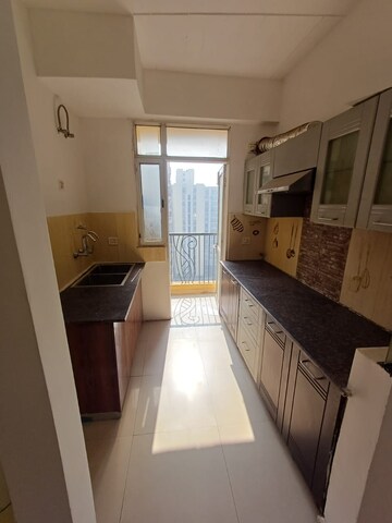 Kitchen in 3 BHK Apartment at ATS Nobility, Sector 4 Greater Noida – for Rent