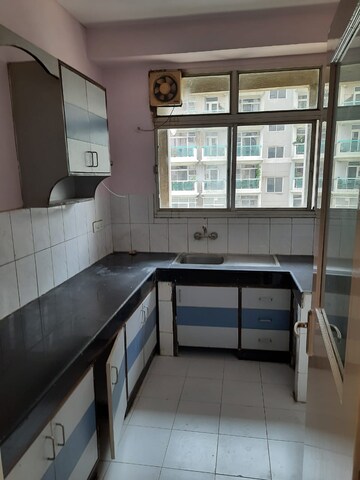 Kitchen in 2 BHK Apartment at Ansal Valley View Estate, Gwal Pahari – for Sale
