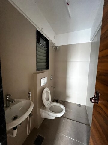 Bathroom in 3 BHK Apartment at Je And Vee Om Trimurti, Malad East – for Sale