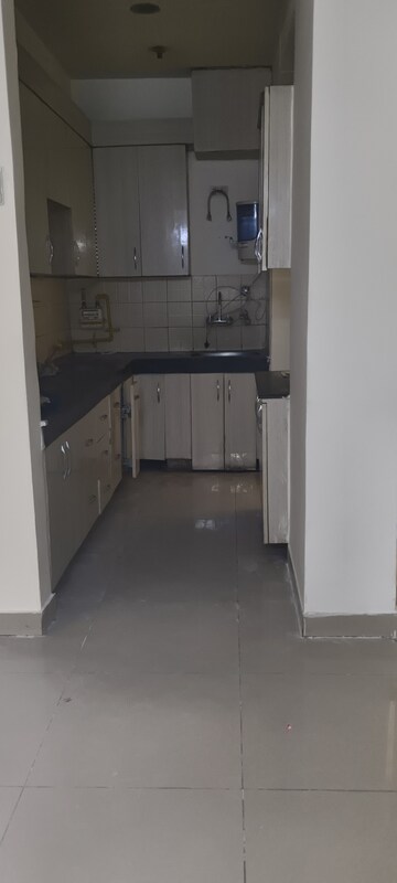 Kitchen in 3 BHK Apartment at Ajnara Grace, Raj Nagar Extension – for Rent