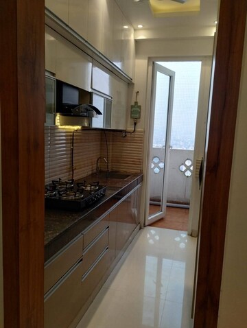 Kitchen in 2.5 BHK Apartment at RG Luxury Homes, Sector 16b Greater Noida – for Rent