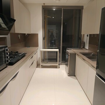 Kitchen in 4 BHK Apartment at Rustomjee Crown, Gokhale Road – for Rent