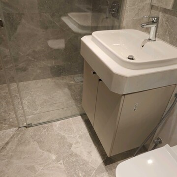 Bathroom in 4 BHK Apartment at Rustomjee Crown, Gokhale Road – for Rent