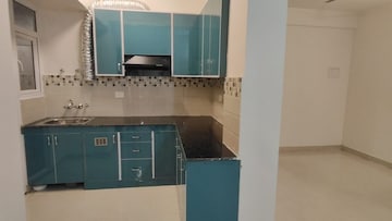 Kitchen in 2 BHK Apartment at Signature Orchard Avenue 2, Sector 93 – for Rent