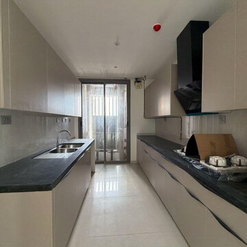 Kitchen in 4 BHK Apartment at Rustomjee Crown, Gokhale Road – for Rent