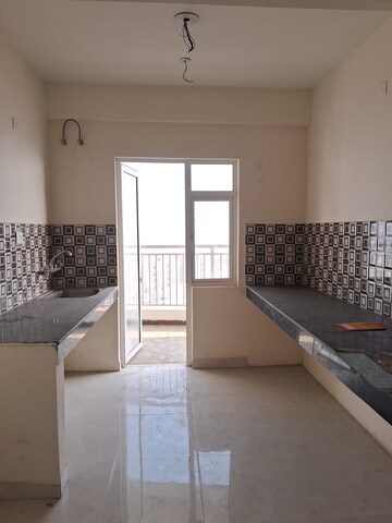 Kitchen in 4 BHK Apartment at VVIP Mangal, Raj Nagar Extension – for Sale