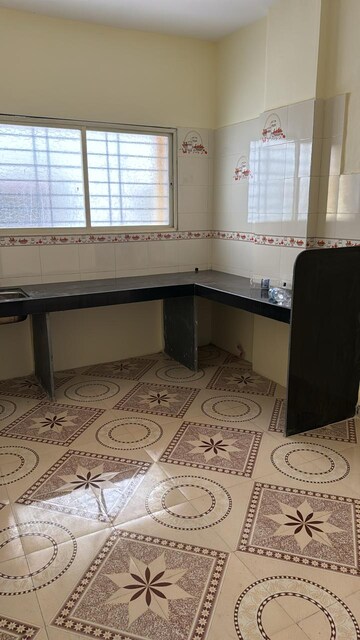 Kitchen in 2 BHK Builder Floor at Siddhivinayak Complex, Shivane – for Sale