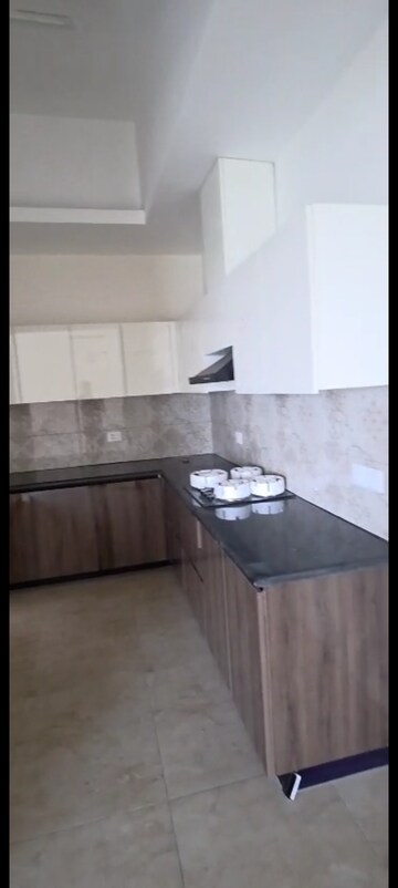 Kitchen in 4 BHK Apartment at Uchdpl Veridia Oakwood Enclave, Wave City – for Rent