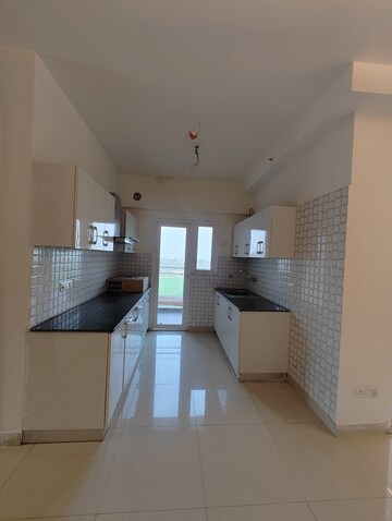 Kitchen in 2.5 BHK Apartment at Samridhi Luxuriya Avenue, Sector 150 – for Sale
