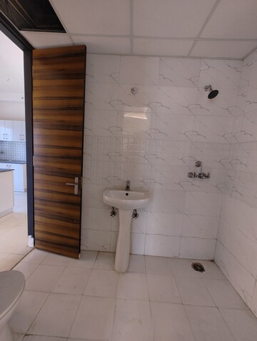 Bathroom in 3 BHK Apartment at Samridhi Luxuriya Avenue, Sector 150 – for Sale