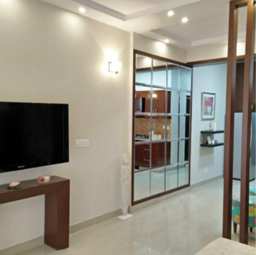 Living Room in Studio Apartment at Eldeco Edge, Sector 119 – for Sale