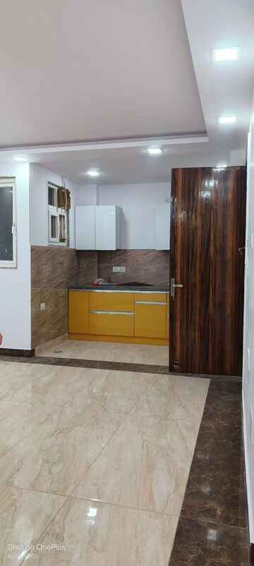 Kitchen in 2 BHK Apartment at Sector 18a Dwarka – for Rent