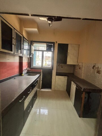 Kitchen in 1 BHK Apartment at Sanghvi Hills, Ghodbunder Road – for Rent