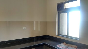 Kitchen in 1 BHK Apartment at Lodha Splendora, Ghodbunder Road – for Sale