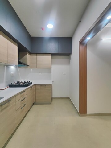 Kitchen in  Apartment at Bhartiya Nikoo Homes Phase 2, Thanisandra Main Road – for Rent