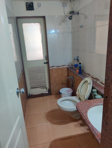 Bathroom in 2 BHK Apartment at Kalpataru Classic, Malad West – for Rent