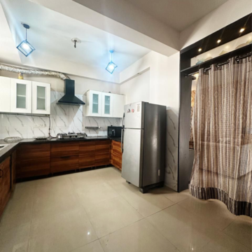 Kitchen in 3 BHK Apartment at NK Sharma Savitry Greens, Vip Road – for Rent
