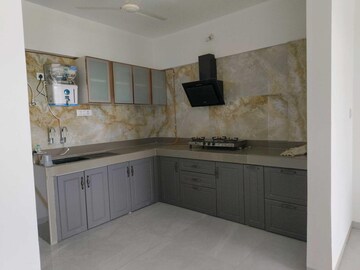 Kitchen in 4 BHK Apartment at Oxy Beaumonde, Viman Nagar – for Sale