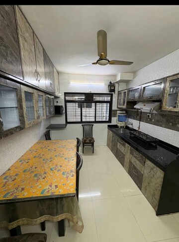 Kitchen in 2 BHK Apartment at Naresh Empire CHS, Mira Road – for Rent