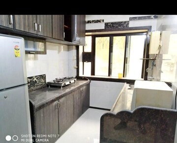 Kitchen in 2 BHK Apartment at Salasar Woods, Mira Road – for Sale