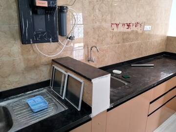Kitchen in 2 BHK Apartment at NG Rathi Palm Nest, Wagholi – for Rent