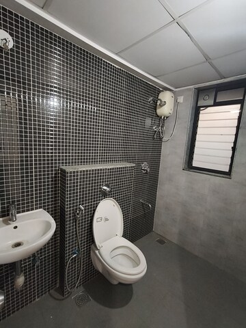 Bathroom in 2 BHK Apartment at Lodha Lakeshore Greens, Dombivli East – for Rent