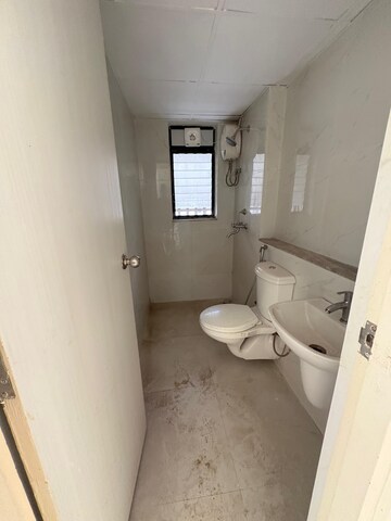 Bathroom in 3 BHK Apartment at Runwal Gardens Phase 2, Dombivli East – for Sale