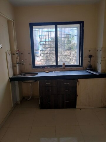 Kitchen in 1 BHK Apartment at RNA NG Regency Phase I, Balkum Pada – for Rent