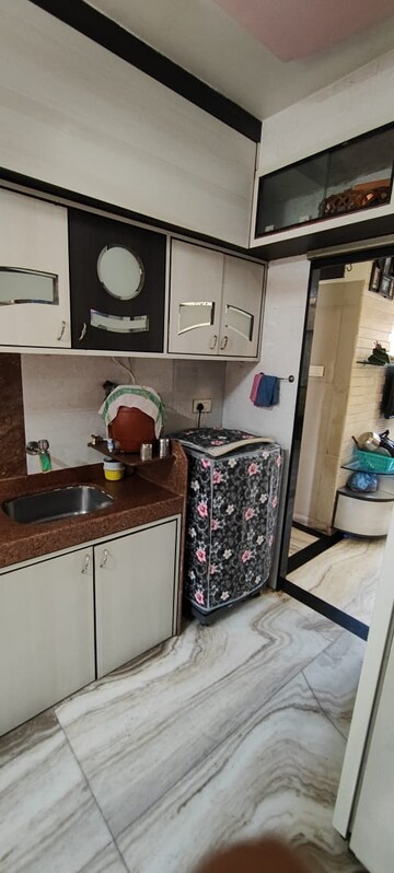 Kitchen in 2 BHK Apartment at Adinath Building, Masjid Bunder – for Sale