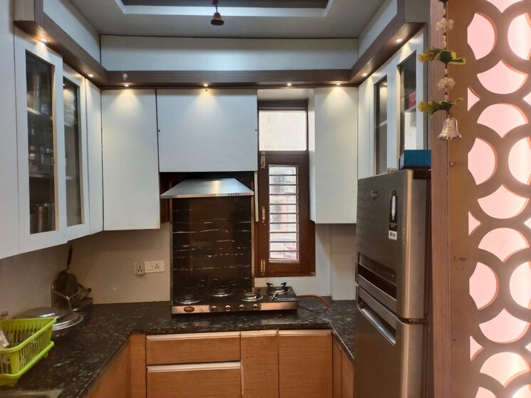 Kitchen, tomar colony 3 Bedroom 900 Sq.Ft. Apartment In Tomar Colony Delhi 9783925