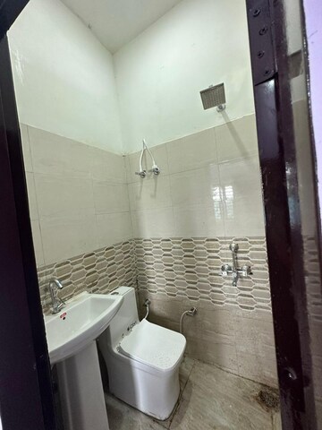 Bathroom in 2 BHK Apartment at Gulmohur Garden, Raj Nagar Extension – for Sale