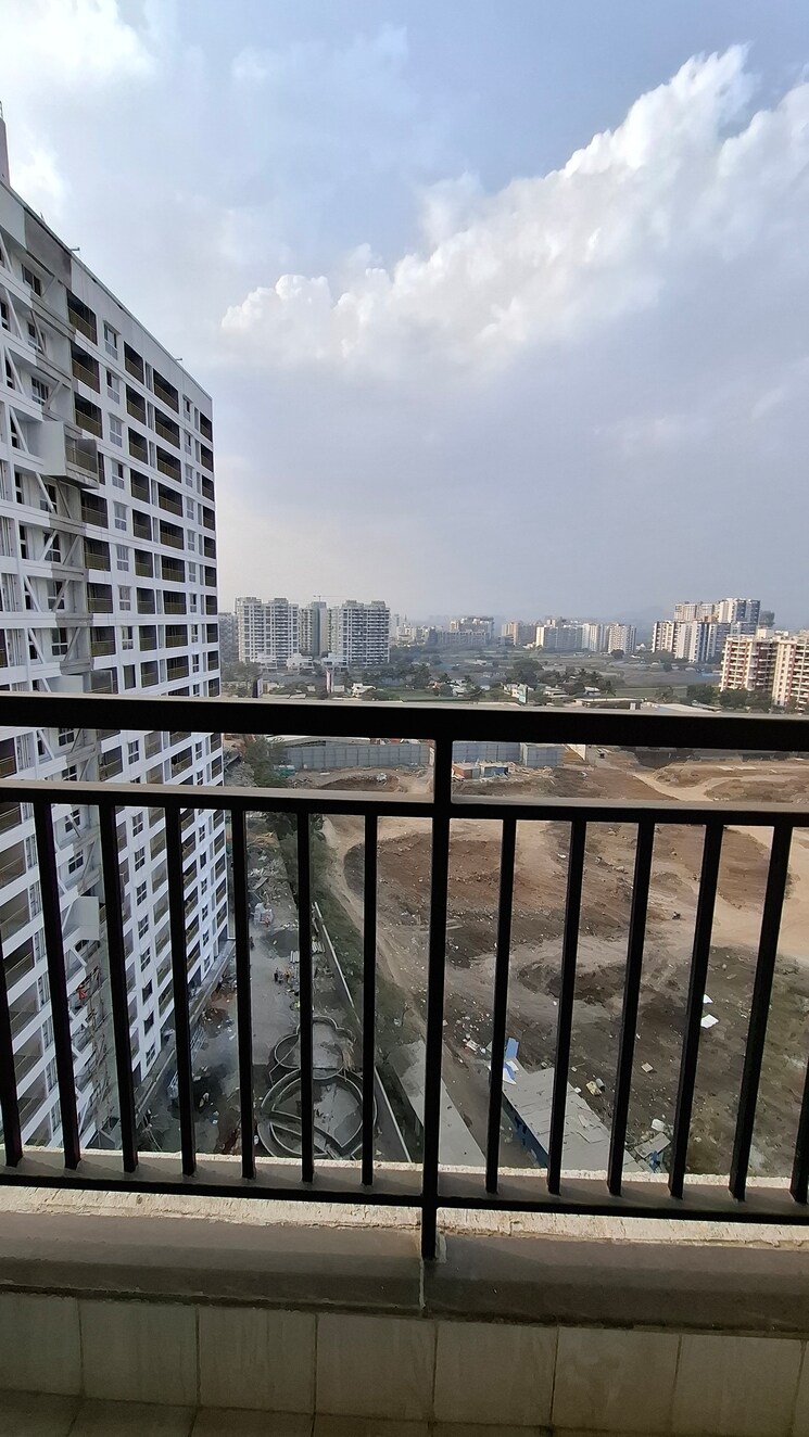 Balcony, unique-k-shire 2 Bedroom 808 Sq.Ft. Apartment In Punawale Pune 9787251